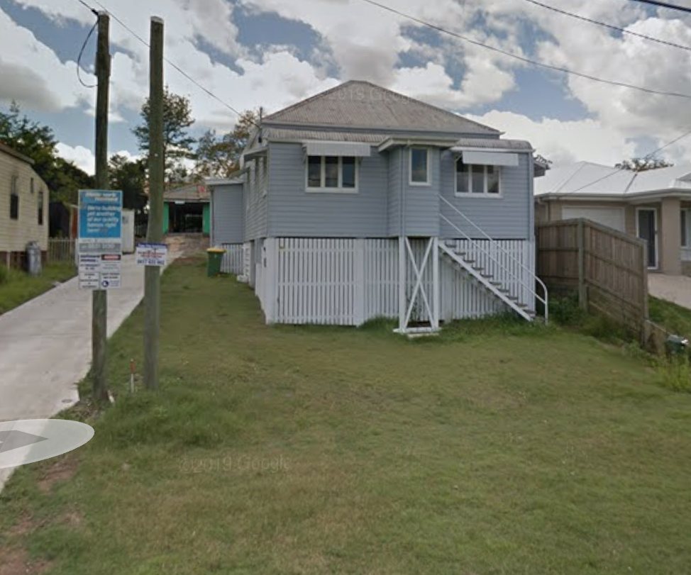 The renovated front house with the rear build underway, 2015